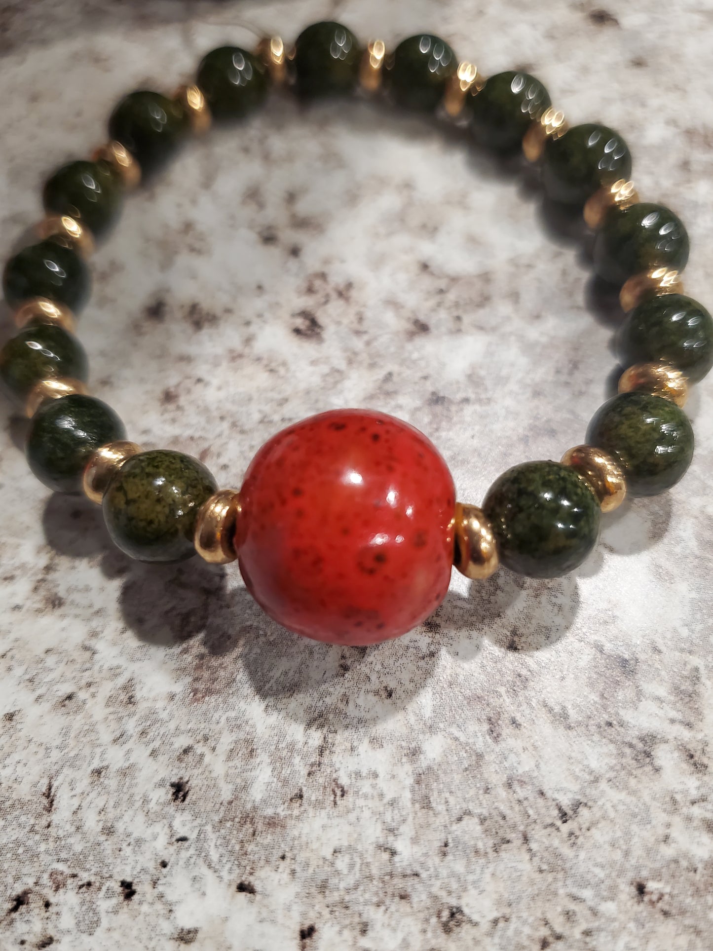 Dark green and orange glass bead bracelet