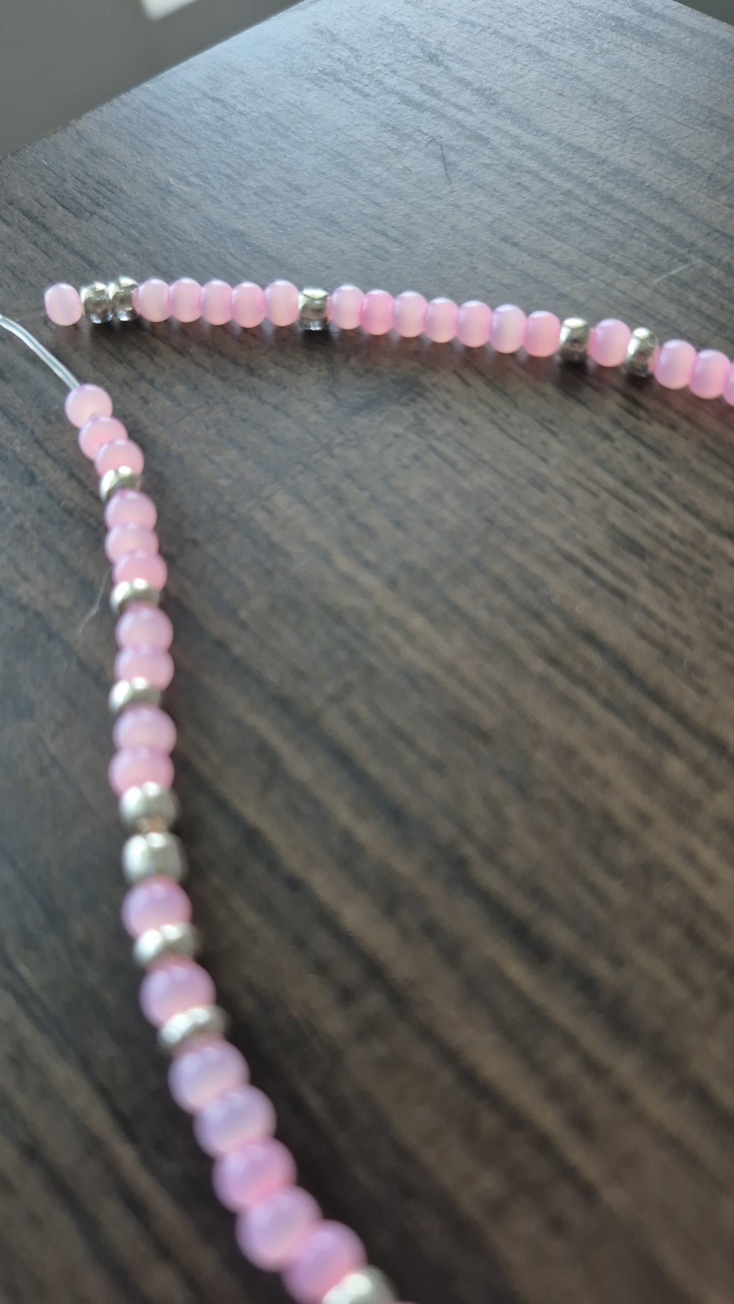 Pink cats eye and silver tie on anklet