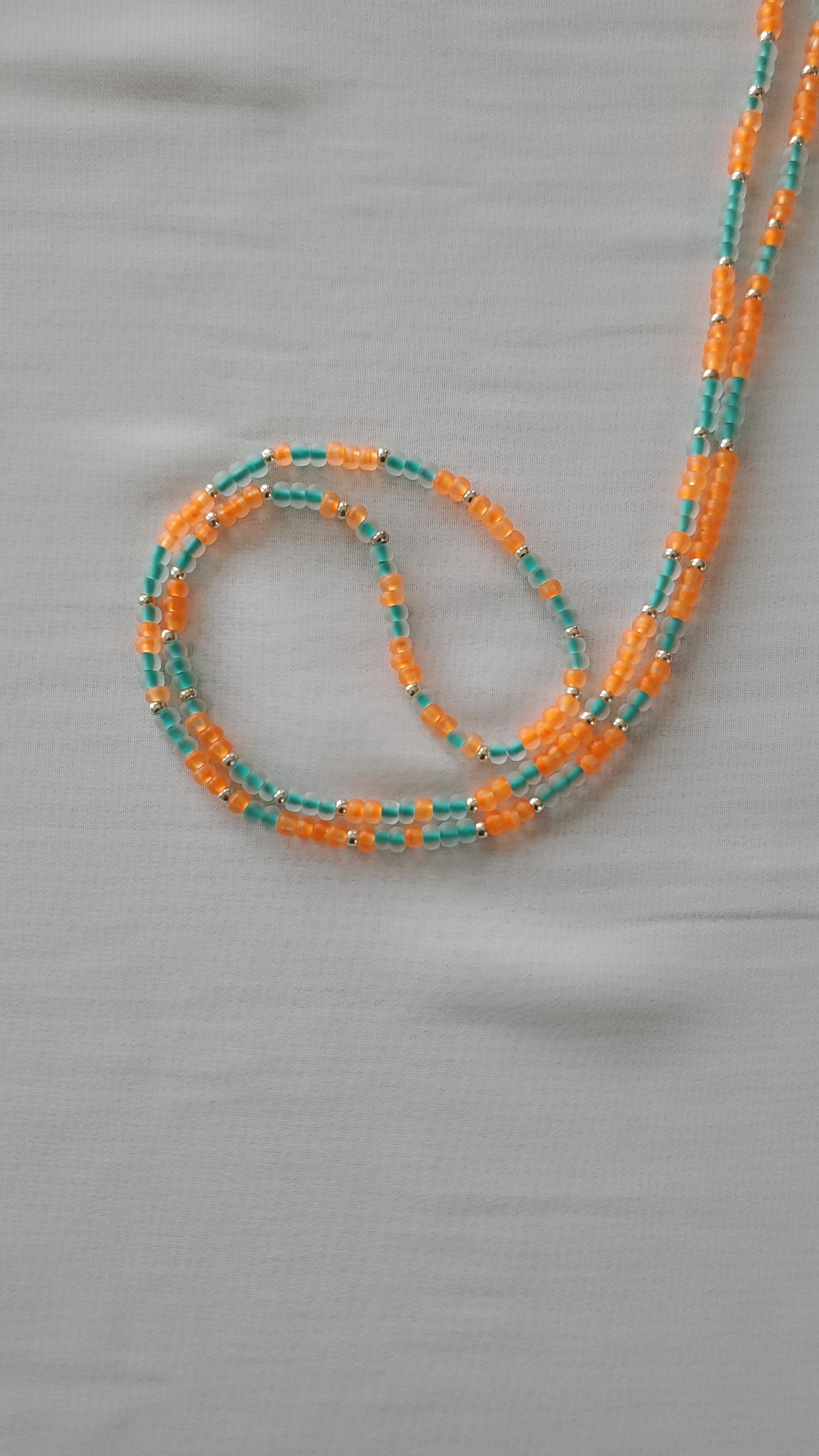 Orange and teal waistbead