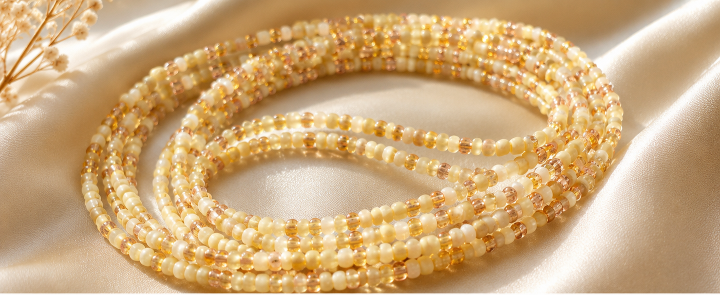 Cream and gold tie on waistbead