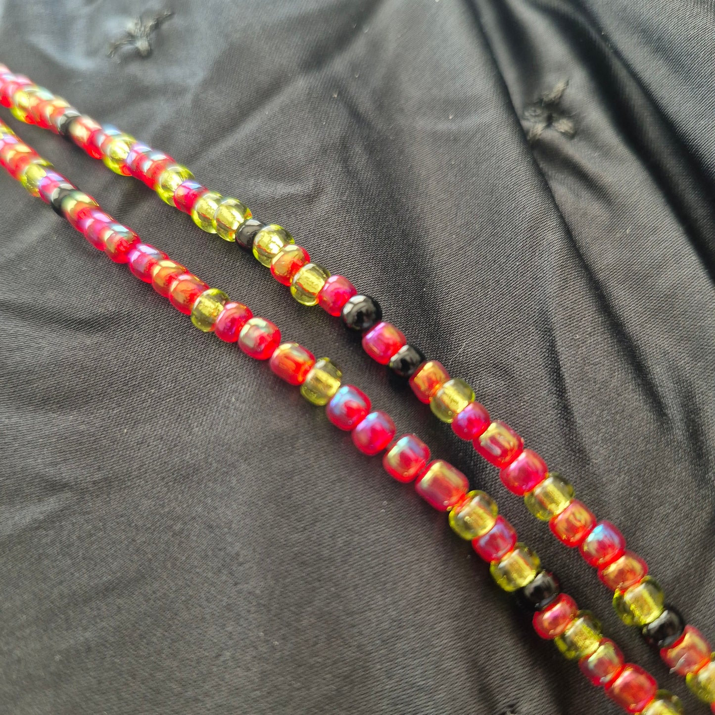 Red, green and black tie on handcrafted waistbead