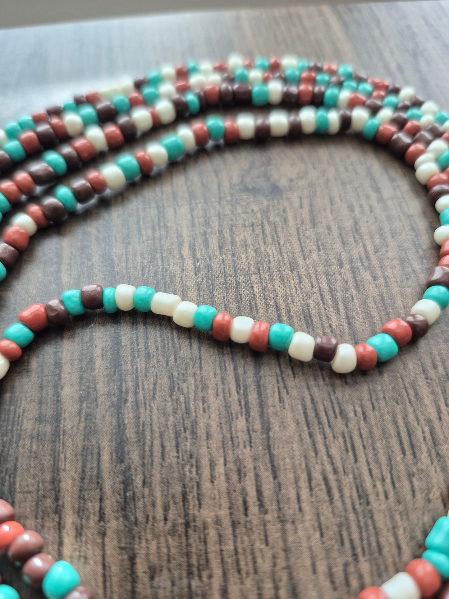 Brown, cream and teal tie on waistbead