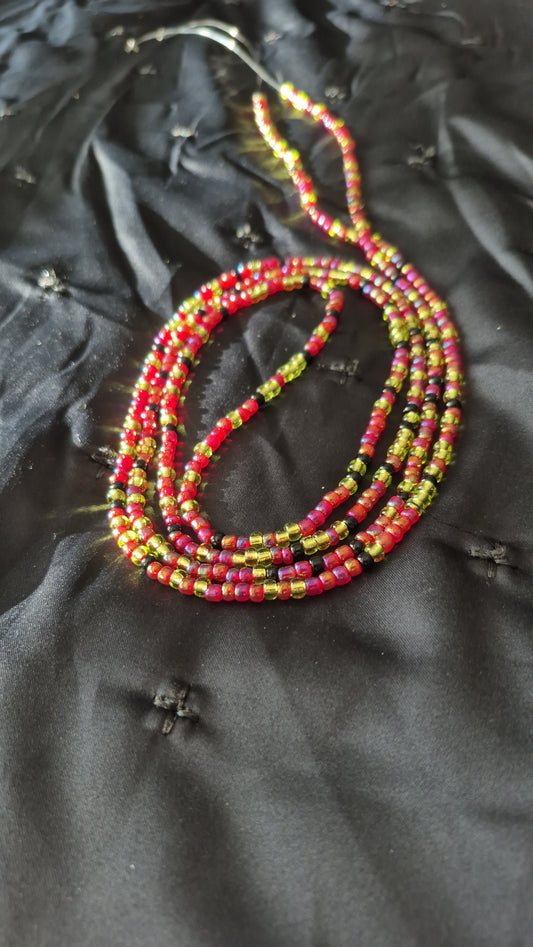 Red, green and black tie on handcrafted waistbead