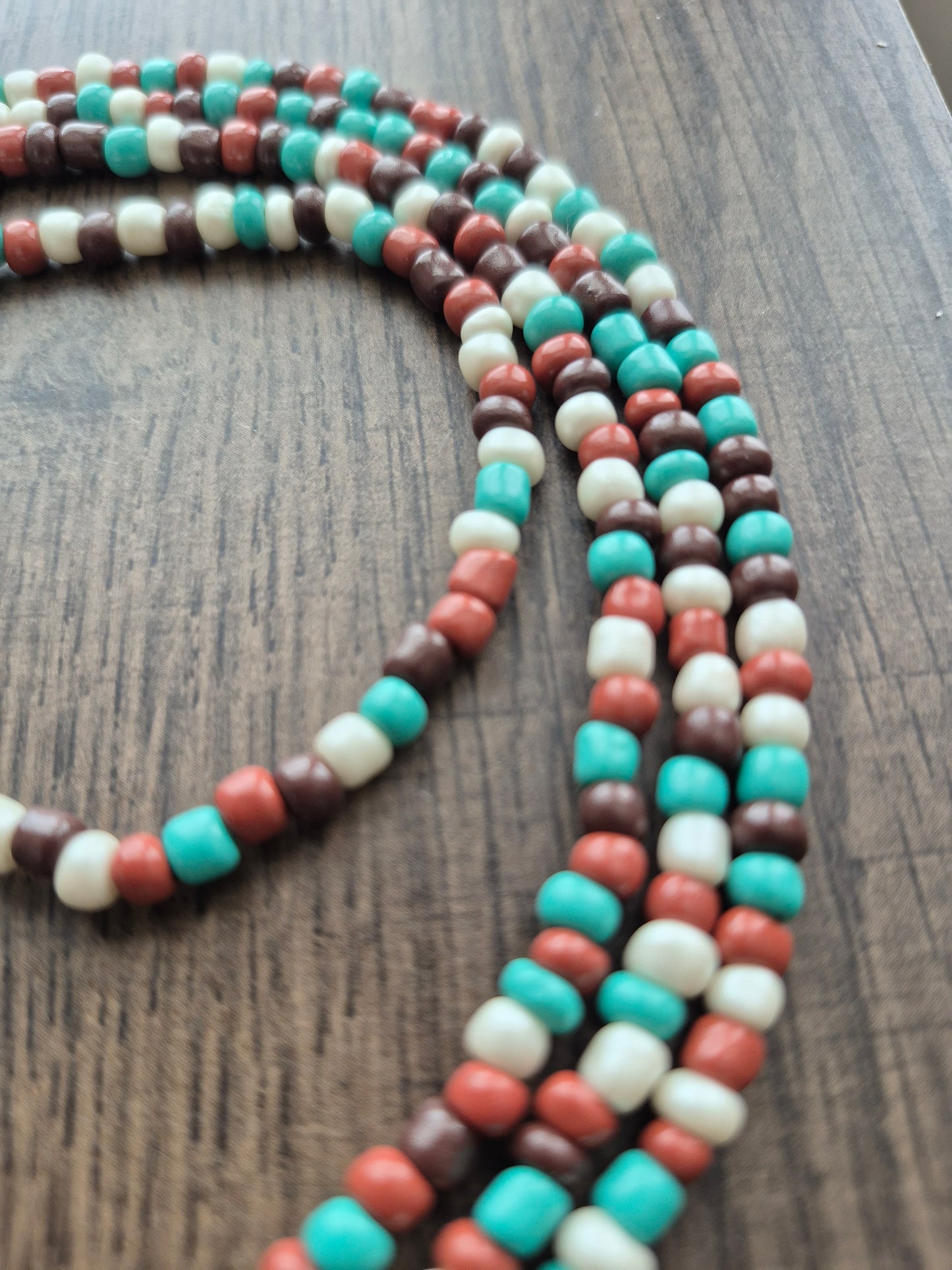 Brown, cream and teal tie on waistbead