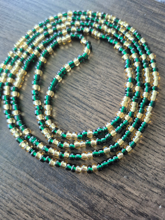 Emerald green and gold tie on waistbead
